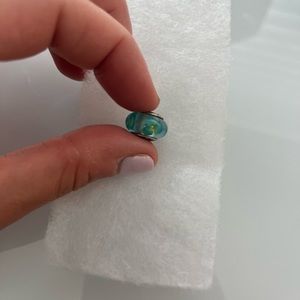 Green, yellow, and blue flower Pandora charm